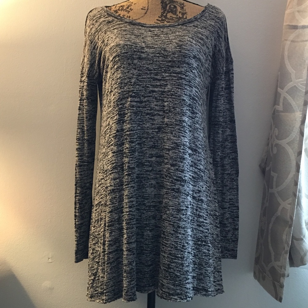 PoofW knee length dress, thing and lightweight.
